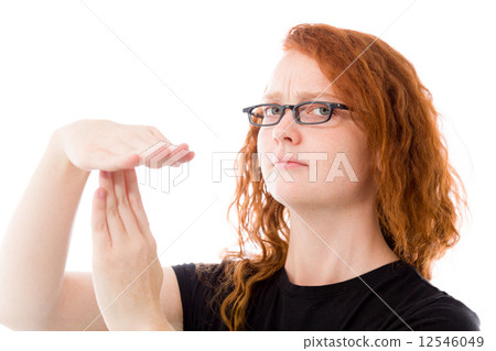 圖庫照片: model isolated on plain background hand gesture break