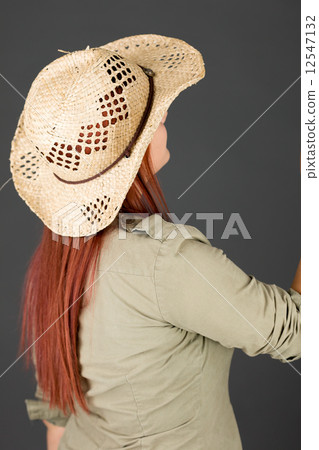 model isolated on plain background back looking behind model isolated on plain background back looking behind 12547132
