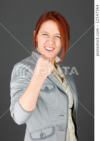 model isolated on grey background 12547364