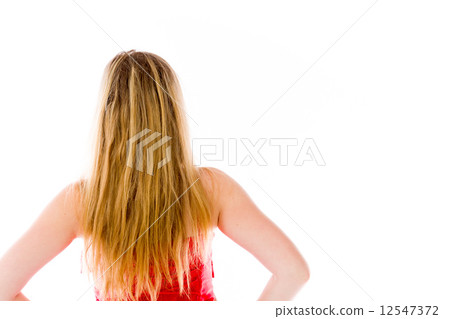 model isolated on plain background back hands on hips model isolated on plain background back hands on hips 12547372