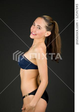 model isolated on plain background back turning around model isolated on plain background back turning around 12547845