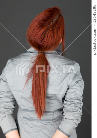 model isolated on plain background back looking behind model isolated on plain background back looking behind 12548296