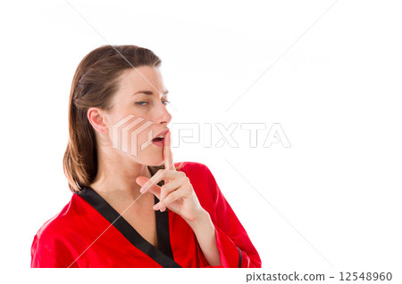 model isolated with finger on lips secret model isolated with finger on lips secret 12548960
