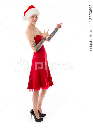 model isolated on plain background looking at camera pointing 12550645