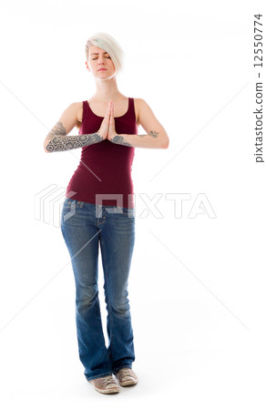 model isolated on plain background praying wishing model isolated on plain background praying wishing 12550774