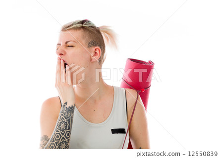 model isolated on plain background tired bored yawning 12550839