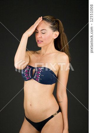 model isolated on plain background confused headache model isolated on plain background confused headache 12551008