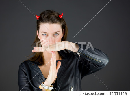model isolated on plain background hand gesture break sign 12551129