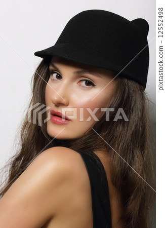 Portrait of Young Woman in Dark Hat 12552498