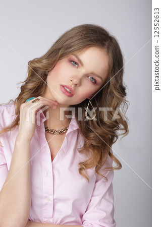 Sensuality. Stylish Lady in Pink Blouse with Ornamentation 12552613