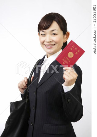A woman with a passport A woman with a passport 12552903