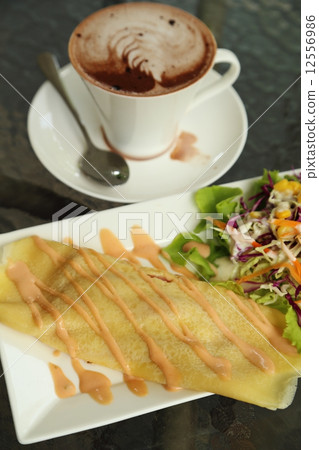 Crepe Cake with cup of hot chocolate 12556986