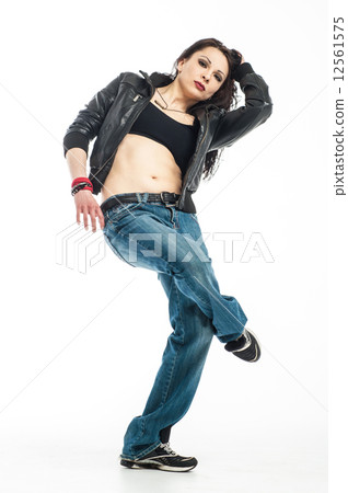 Brunett dancer. Woman dancing in a studio 12561575