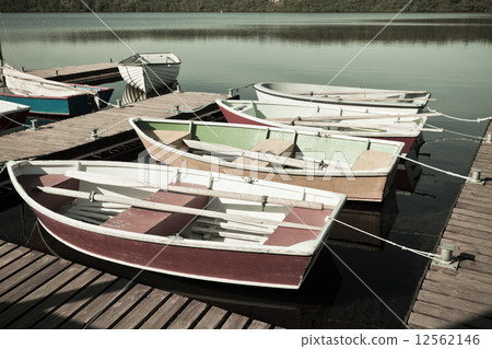 Floating Wooden Boats with Paddles 12562146