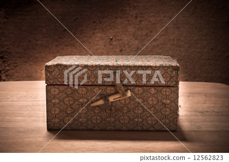 Old open vintage box with grunge background, still life. Old open vintage box with grunge background, still life. 12562823