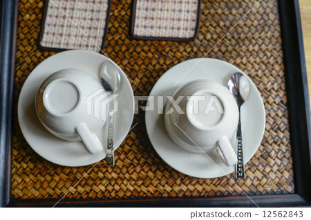 Couple coffee cups set on tray. 12562843