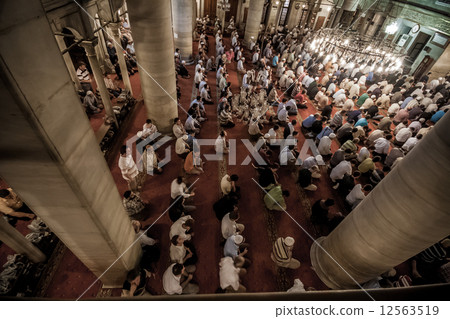 Praying in Eyup Mosque Praying in Eyup Mosque 12563519