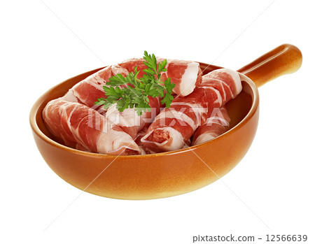 sausages wrapped in bacon in a frying pan, chevapchichi on white background sausages wrapped in bacon in a frying pan, chevapchichi on white background 12566639