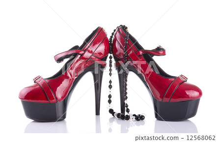 Red high heel female shoes with black necklace Red high heel female shoes with black necklace 12568062
