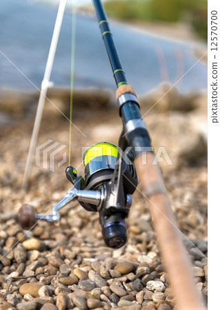 Modern clean fishing rod outdoors Modern clean fishing rod outdoors 12570700