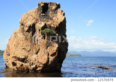 Rocky beach on the bank of island "Putjatin". Russia 12570974