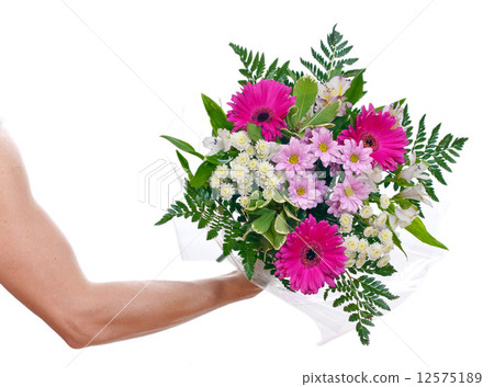 Brawny man's hand with a bouquet of flowers 12575189