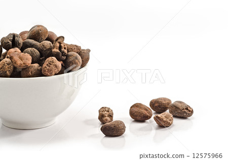 Cup full of shea nuts 12575966
