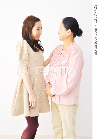 Mother and daughter  12577425