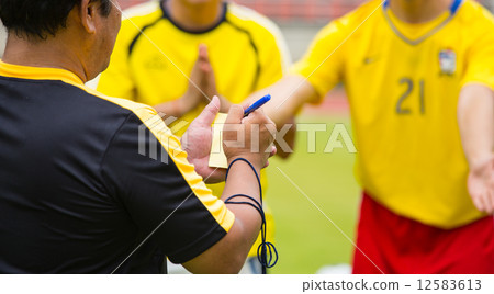 Referee soccer show card for warning and recorded player foul Referee soccer show card for warning and recorded player foul 12583613