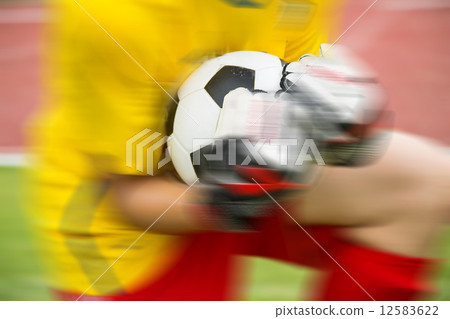Goalkeeper used hands for catches the ball Goalkeeper used hands for catches the ball 12583622
