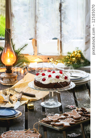 Table setting with chocolate cake 12585070
