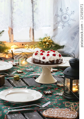 Table setting with chocolate cake 12585071