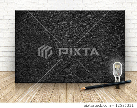 Black stone on the white brick wall and the wood floor,template Black stone on the white brick wall and the wood floor,template 12585331