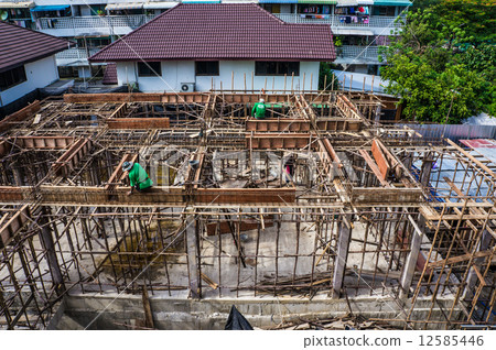Construction workers New residential construction Construction workers New residential construction 12585446
