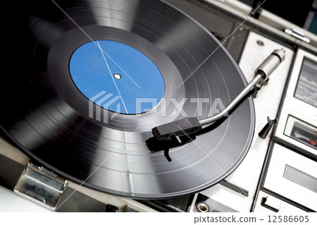 Vinyl record on turntable 12586605