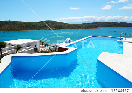 Swimming pool at luxury hotel, Crete, Greece Swimming pool at luxury hotel, Crete, Greece 12588487