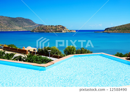 Swimming pool at luxury hotel with a view on Spinalonga Island, Swimming pool at luxury hotel with a view on Spinalonga Island, 12588490