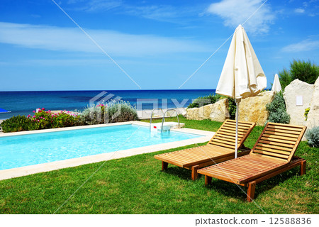 Swimming pool at luxury villa, Crete, Greece Swimming pool at luxury villa, Crete, Greece 12588836