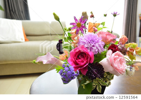 Living room with flowers Living room with flowers 12591564