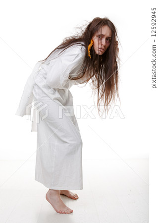 Portrait of a crazy woman in a straitjacket Portrait of a crazy woman in a straitjacket 12592945