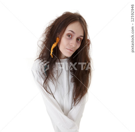 Portrait of a crazy woman in a straitjacket 12592946