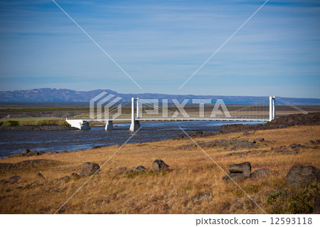 The bridge over Icelandic river Jokulsa a Fjollum 12593118