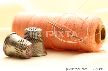 Thread bobbins and sewing thimbles Thread bobbins and sewing thimbles 12593956