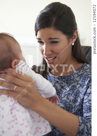 Frustrated Mother Suffering From Post Natal Depression Frustrated Mother Suffering From Post Natal Depression 12594072