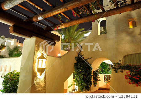 Illuminated recreation area of luxury hotel, Tenerife island, Sp 12594111