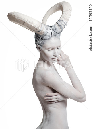 Woman with goat body-art. 12595150
