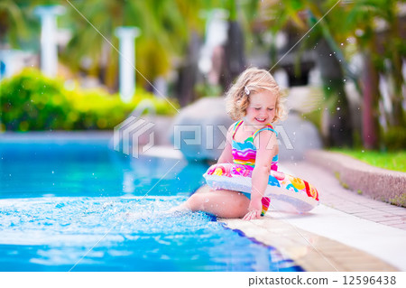 Little girl in a swimming pool 12596438