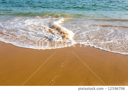Beautiful mediterranean water lapping on the shore 12596706