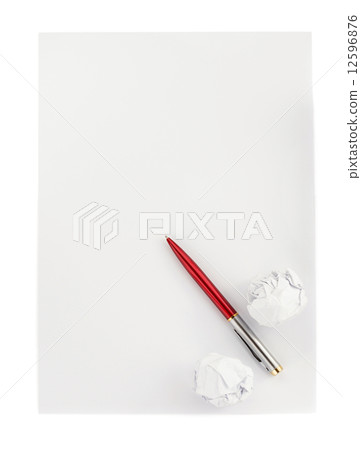 pen and crumpled paper ball on white 12596876