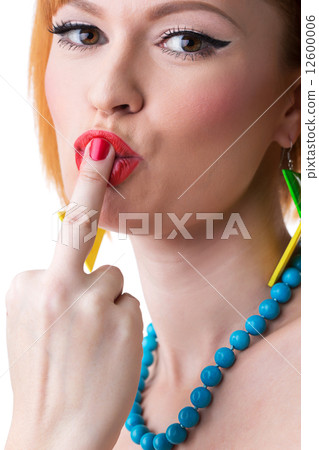 Portrait of cute pin-up girl posing at camera 12600006